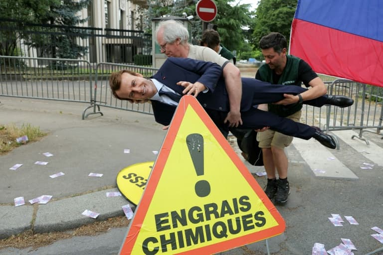 Thumbnail for Greenpeace Nabs Macron Wax Figure, Parks It Outside Russian Embassy