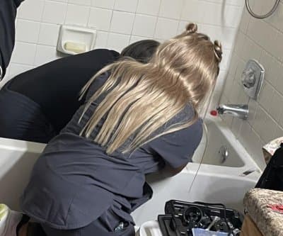 Thumbnail for Roswell Firefighters Rescue Puppy’s Paw from Bathtub Drain: Vet Joins Wet Drama